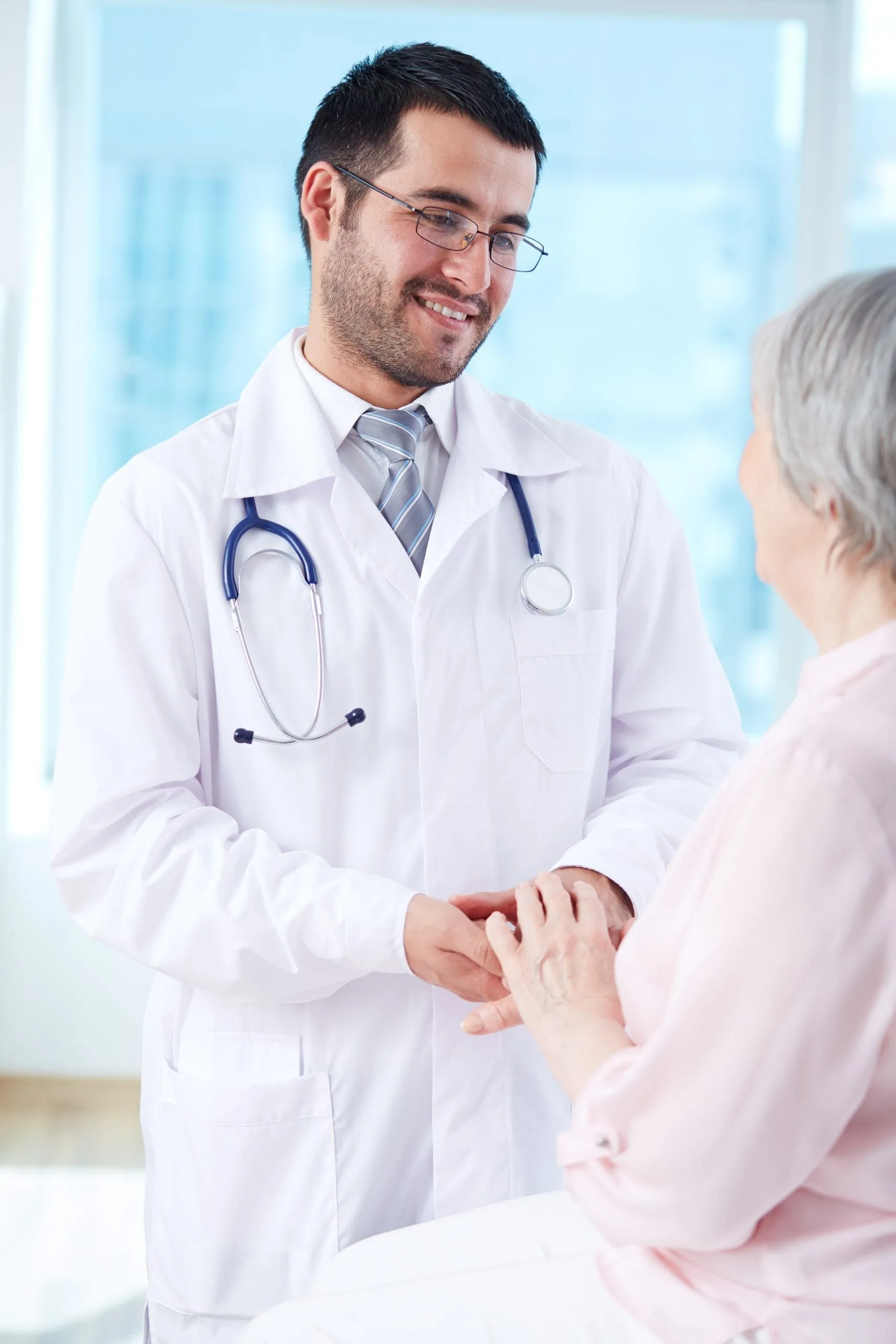 Doctor consulting with an elderly patient about medical marijuana
